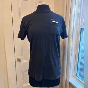 Black cotton short sleeve pocket tee with Snoopy detail above pocket